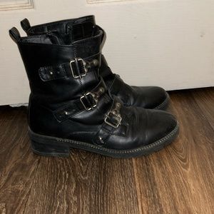 Black buckle combat boots